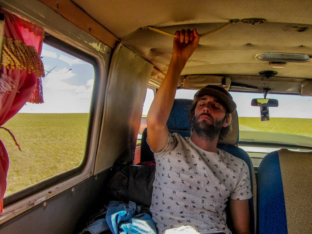 Rick sleeping in the van which drives through the Gobi desert