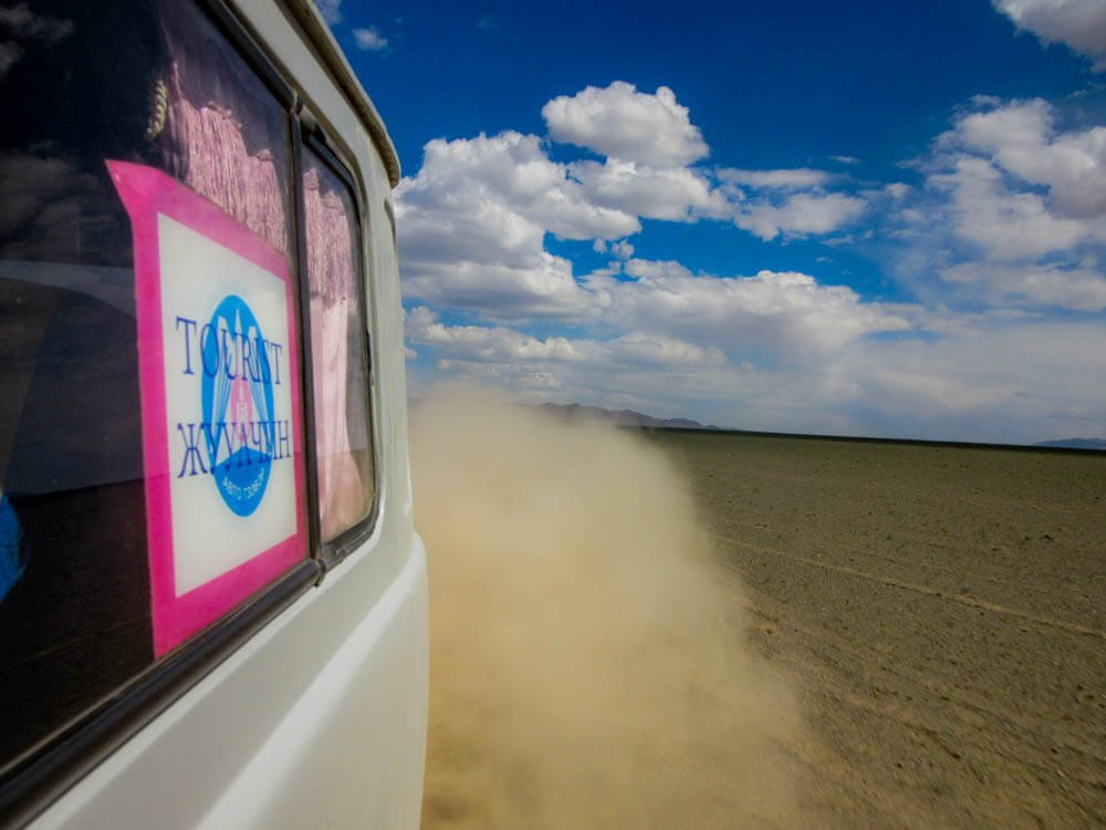 Russian 4WD van driving through the Gobi desert